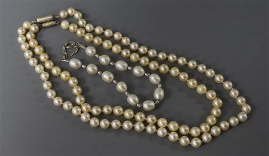 Two single strand cultured pearl necklaces and a silver and cultured pearl bracelet.